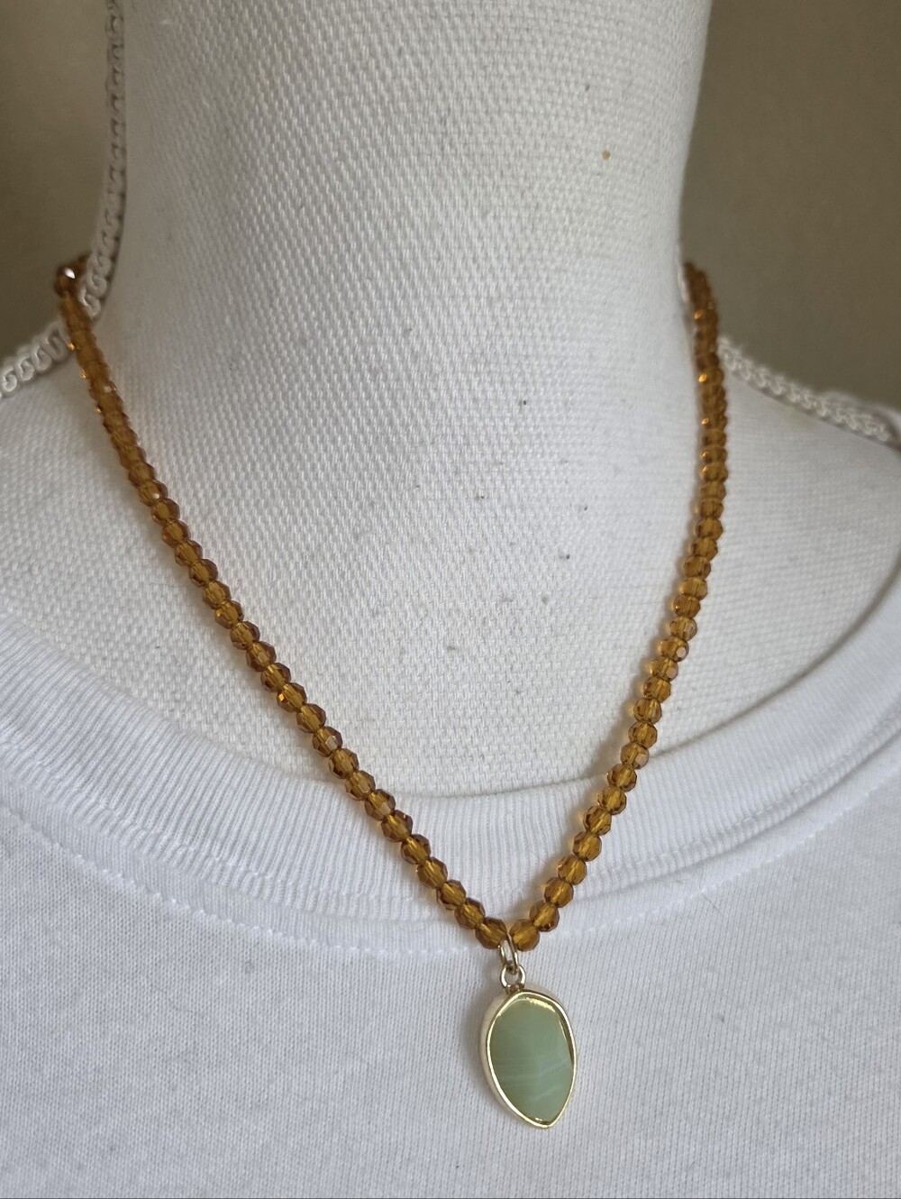 premier designs necklace faceted amber glass beads sage green stone pendant gold